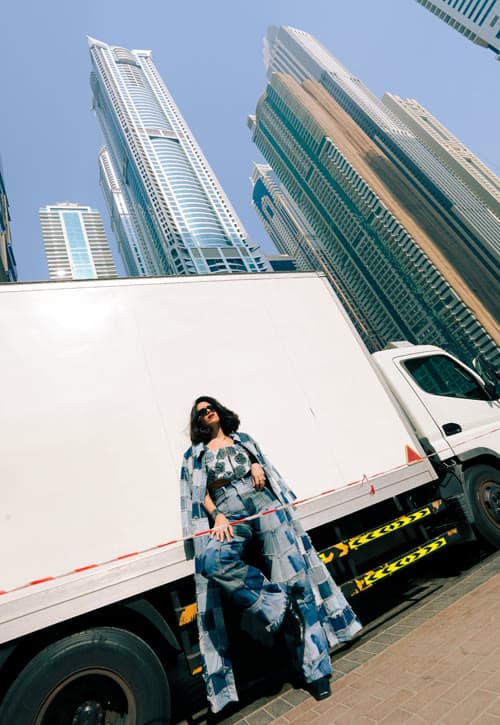 Efaar campaign — denim patchwork against a delivery truck